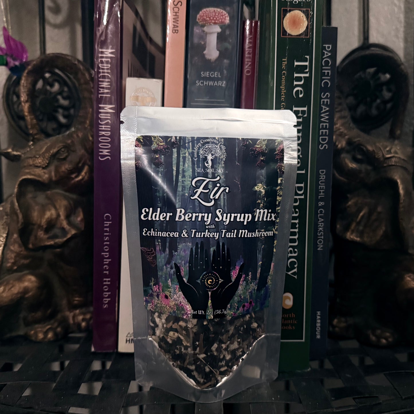 Elder Berry Syrup Mix package with mystical design on a dark background