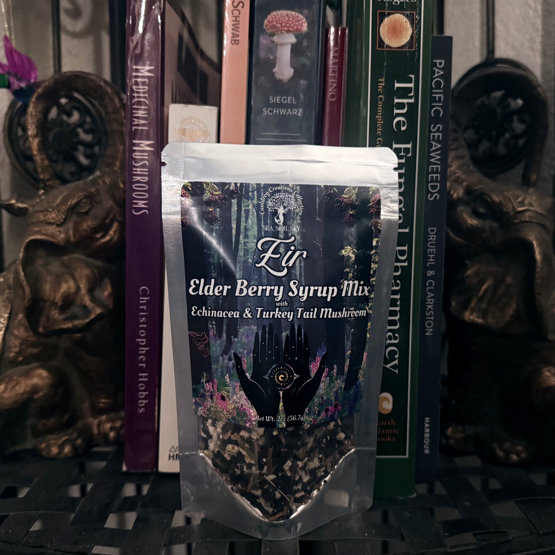 Elder Berry Syrup Mix package with mystical design on a dark background